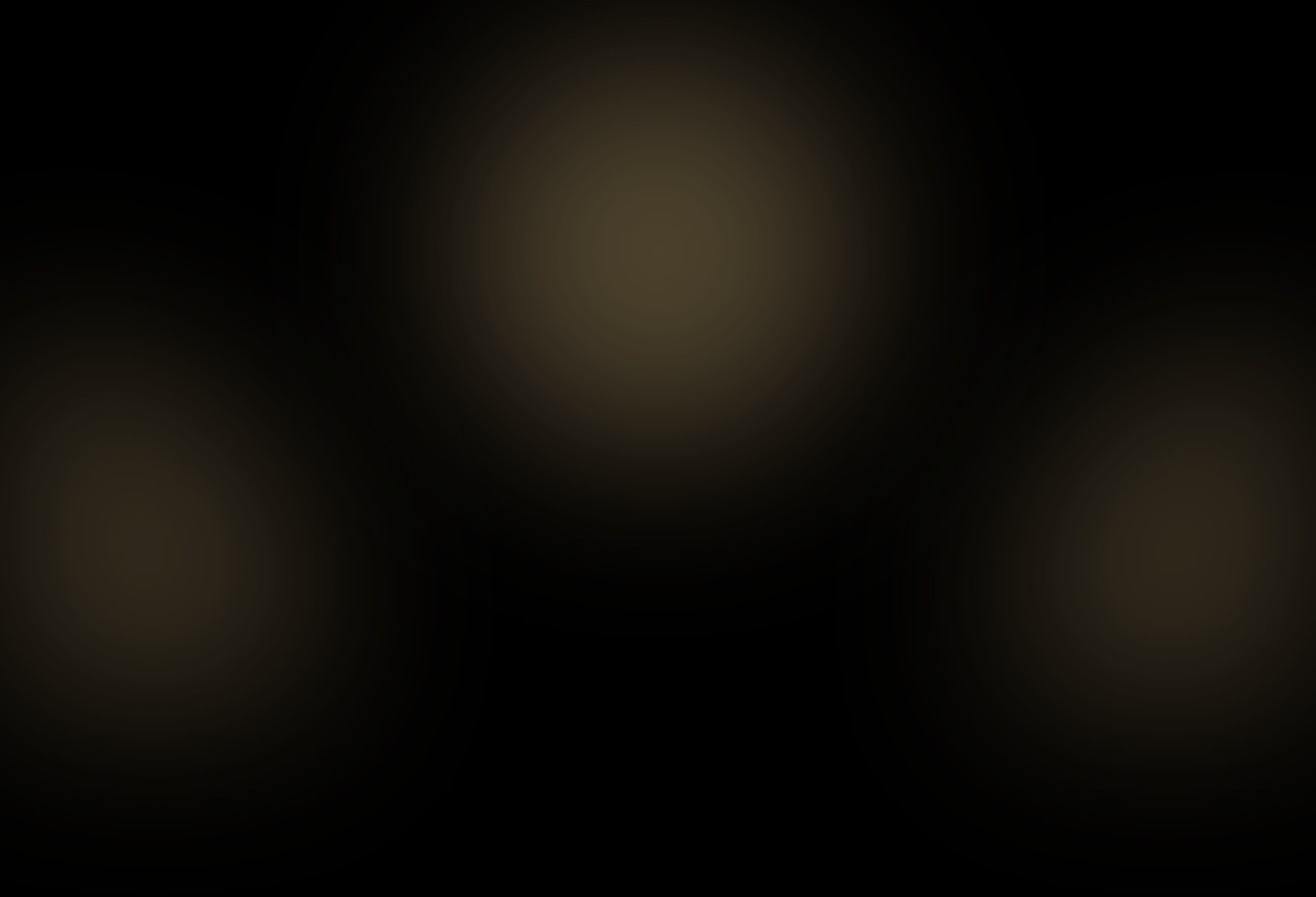 decorative black background with gold bursts